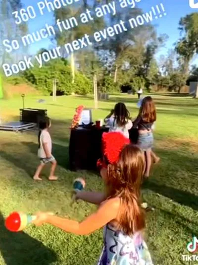 360 photobooth LA - kids playing at an outdoor party