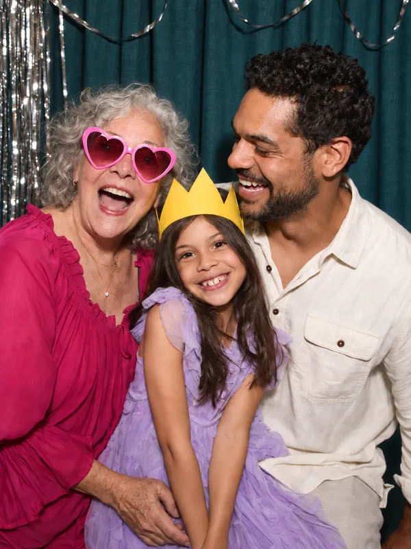 Three generations of family at a Los Angeles party photobooth
